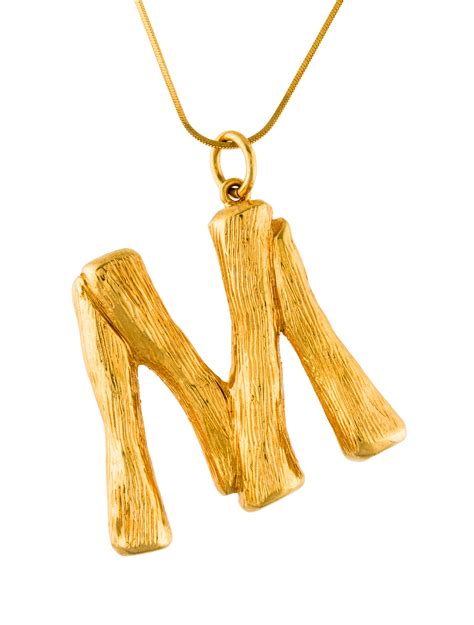 celine alphabet pendants|Celine alphabet dresses.